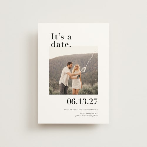 This is a onyx save the date postcards with standard by Joyce Pinheiro called it's a date! printing on signature in postcard