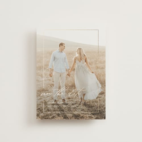 This is a linen save the date postcards with foil pressed by Kelly Schmidt called gilded frame printing on signature in postcard