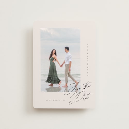 This is a cream petite save the dates with standard by Lori Wemple called posted printing on recycled smooth signature in petite