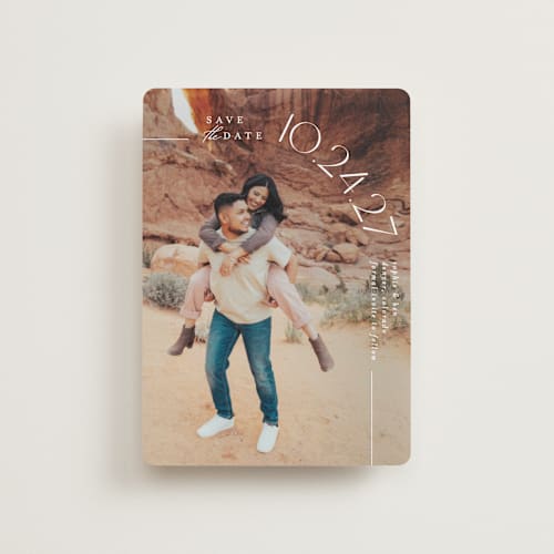 This is a pearl petite save the dates with standard by Brooke Chandler called curved date printing on recycled smooth signature in petite