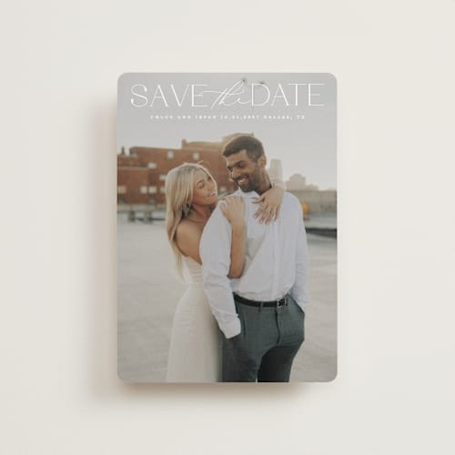 This is a ivory petite save the dates with standard by Maja Cunningham called prose printing on recycled smooth signature in petite