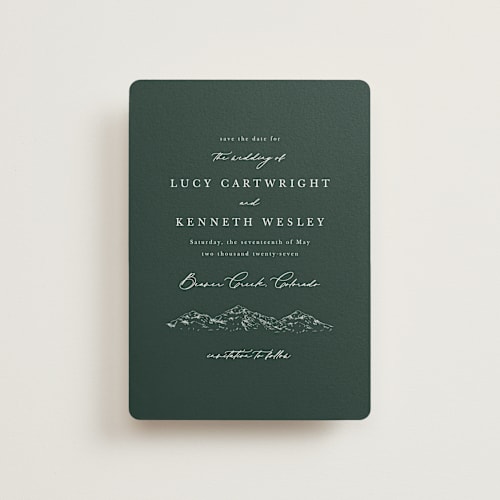 This is a evergreen petite save the dates with standard by Sarah Brown called mountainview printing on signature in petite