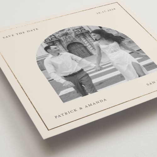 This is a ivory foil stamped save the date cards with foil pressed by Kartika Paramita called arch in a square printing on recycled smooth signature in standard
