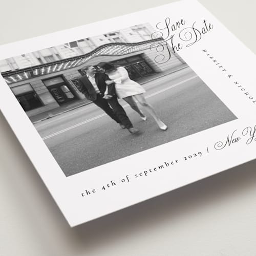 This is a noir slate save the date with standard by Ana de Sousa called written with love printing on recycled smooth signature in standard