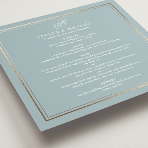 This is a powder blue menu cards with foil pressed by Jennifer Postorino called polished printing on signature in 5x5