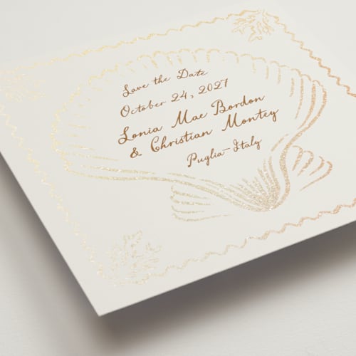 This is a sand foil stamped save the date cards with foil pressed by Pati Cascino called puglia printing on signature in square