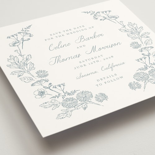 This is a cornflower save the date with standard by Hannah Bowman called toile frame printing on signature in standard
