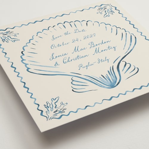This is a ocean save the date with standard by Pati Cascino called puglia printing on signature in square