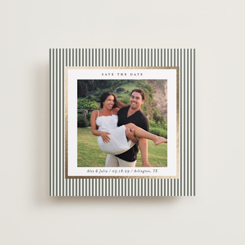 This is a sage green foil stamped save the date cards with foil pressed by Lucrecia Caporale called striped frame printing on recycled smooth signature in standard