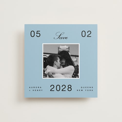 This is a wave save the date with standard by Blustery August called chess printing on recycled smooth signature in standard