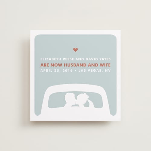 This is a light teal wedding announcements with standard by Three Kisses Studio called just married printing on signature in standard