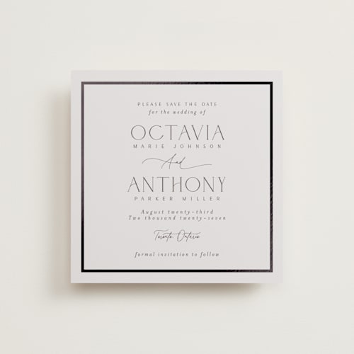 This is a sandstone foil stamped save the date cards with foil pressed by Nicole Walsh called regal printing on signature in square