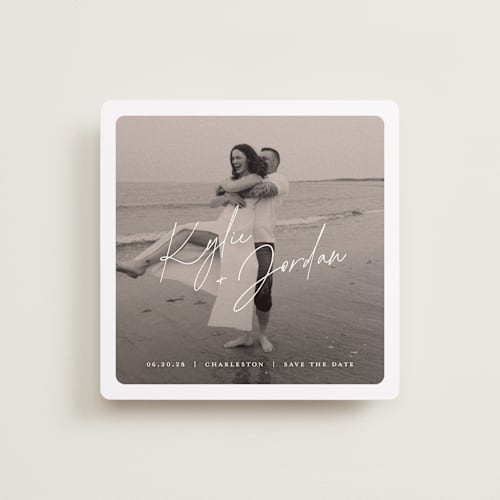 This is a snow save the date with standard by Sarah Curry called film overlay printing on recycled smooth signature in square