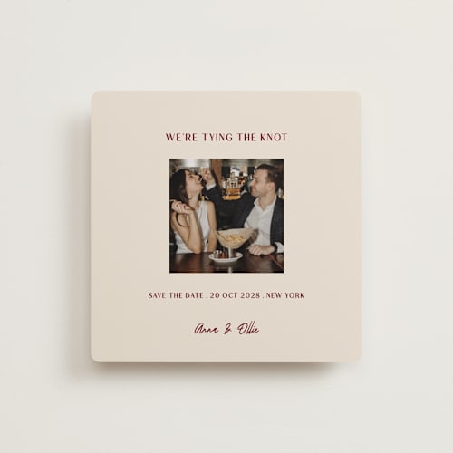 This is a burgundy save the date with standard by Ani Somi called center cut printing on recycled smooth signature in square