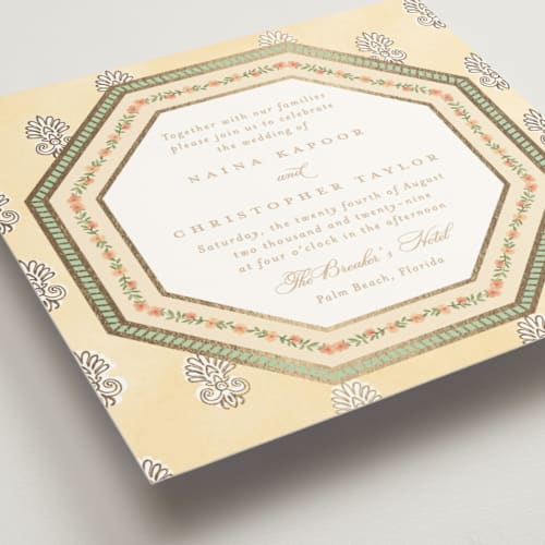 This is a ghee foil stamped wedding invitations with foil pressed by Creo Study called alamgamation printing on signature in standard