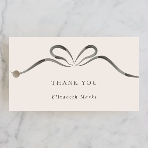 This is a tuxedo gift tags with standard by Corinne Malesic called bow printing on signature in tag