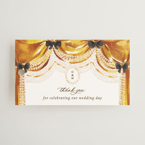 This is a golden wedding favor tags with standard by Claudia Orengo called tuileries printing on signature in tag