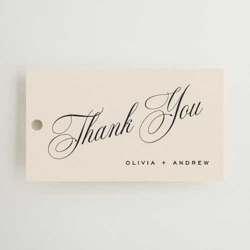 This is a almond wedding favor tags with standard by Eric Clegg called modern romance printing on signature in tag