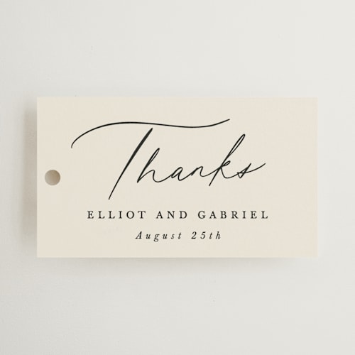 This is a ecru wedding favor tags with standard by Hooray Creative called scripted names printing on signature in tag
