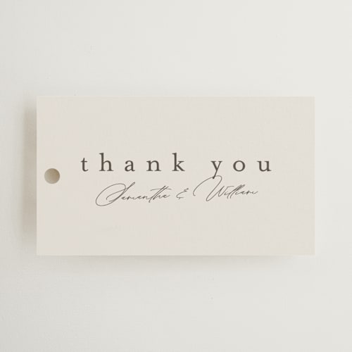 This is a sand wedding favor tags with standard by Nicole Walsh called surround printing on signature in tag