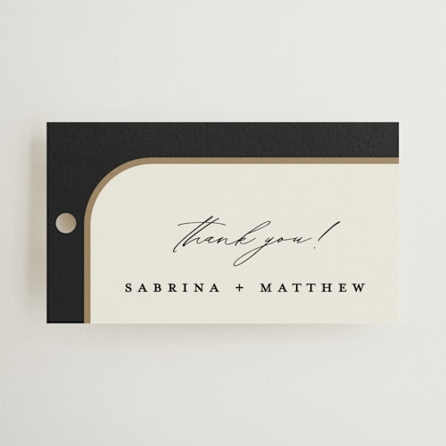 This is a black tie wedding favor tags with standard by Carolyn Nicks called tuxedo printing on signature in tag