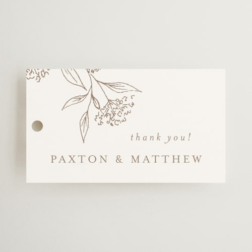 This is a taupe wedding favor tags with standard by Chris Griffith called monogrammed printing on signature in tag