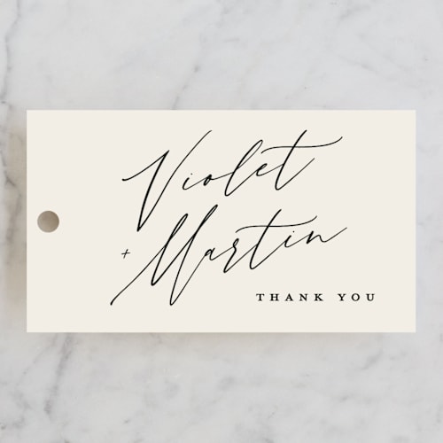This is a linen wedding favor tags with standard by Kelly Schmidt called violet  printing on signature in tag