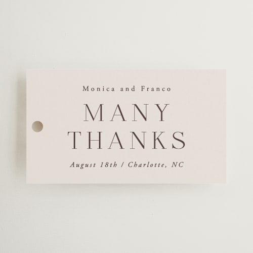 This is a cream wedding favor tags with standard by Hooray Creative called and centered printing on signature in tag