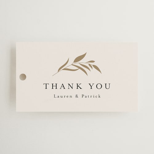 This is a porcelain wedding favor tags with standard by Jennifer Postorino called natural monogram printing on signature in tag
