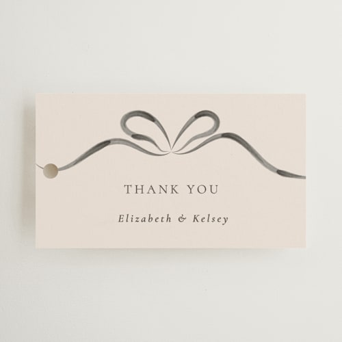 This is a tuxedo wedding favor tags with standard by Corinne Malesic called bow printing on signature in tag