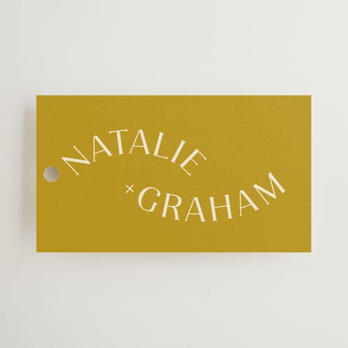 This is a marigold wedding favor tags with standard by Stacey Day called swoop printing on signature in tag