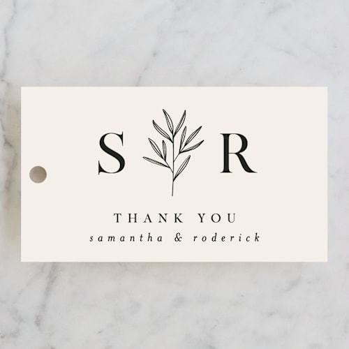 This is a taupe wedding favor tags with standard by Kelly Schmidt called italia printing on signature in tag