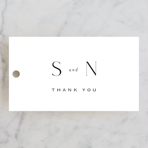 This is a bridal white wedding favor tags with standard by Design Lotus called more than words printing on signature in tag