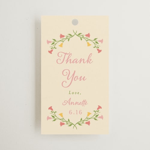 This is a golden gift tags with standard by Sarah Rosenthal called gardenia printing on signature in tag