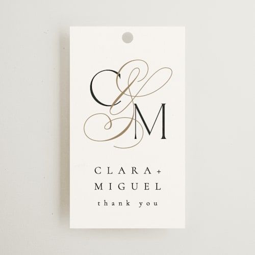 This is a silk wedding favor tags with standard by Kelly Schmidt called golden ampersand printing on signature in tag