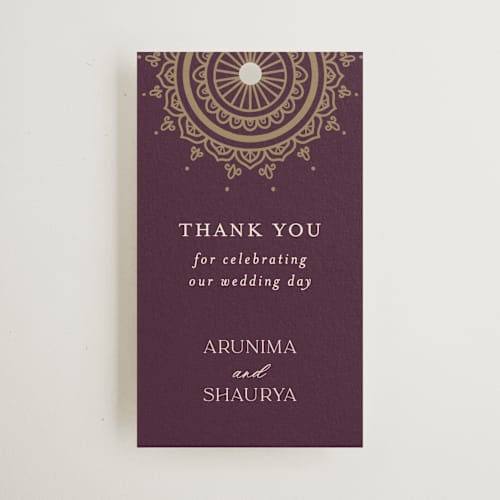 This is a plum wedding favor tags with standard by Randi Cirelli called arunima printing on signature in tag
