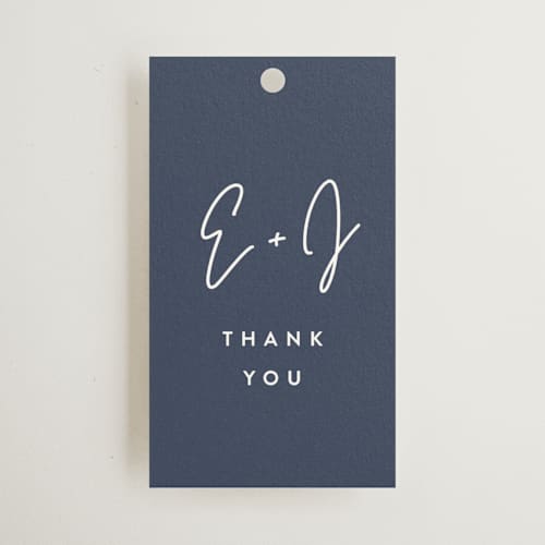 This is a navy wedding favor tags with standard by JoAnn Jinks called marked printing on signature in tag
