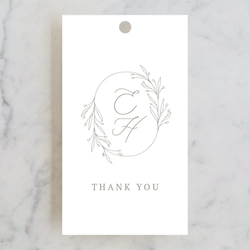 This is a mist wedding favor tags with standard by Design Lotus called essential printing on signature in tag