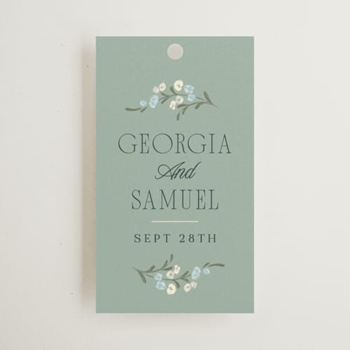 This is a butter mint wedding favor tags with standard by Laura Hankins called trailing garden printing on signature in tag