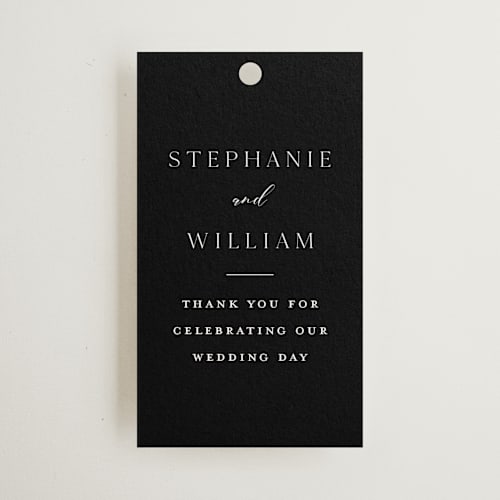 This is a noir wedding favor tags with standard by Stacey Meacham called elegant station printing on signature in tag
