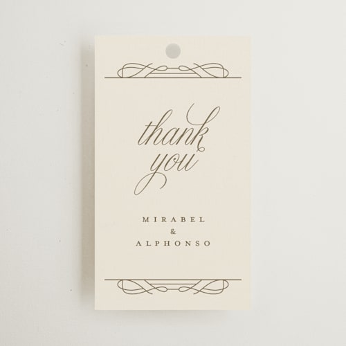 This is a cream wedding favor tags with standard by Katie Zimpel called simple art nouveau printing on signature in tag