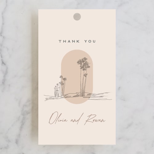 This is a sand wedding favor tags with standard by Owl and Toad called sunset beach printing on signature in tag