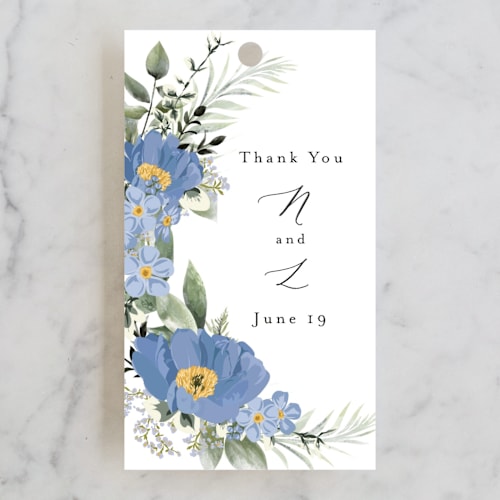 This is a periwinkle wedding favor tags with standard by Susan Moyal called botanical swag printing on signature in tag