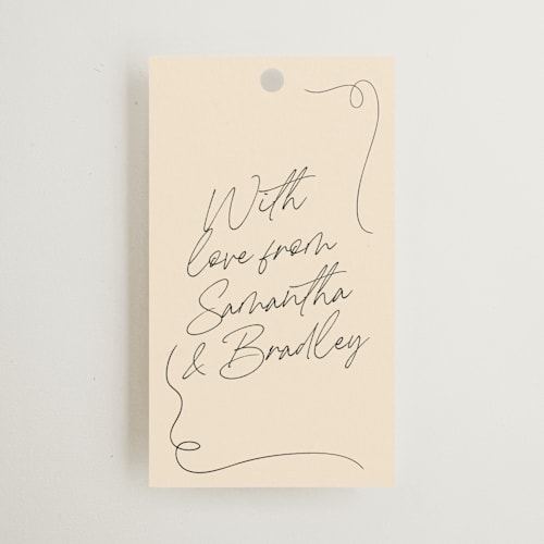 This is a champagne wedding favor tags with standard by Wallace Design Co. called french whimsy script printing on signature in tag