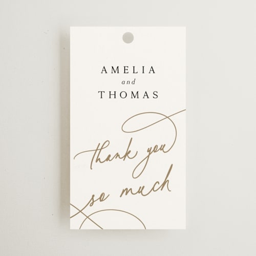 This is a marshmallow wedding favor tags with standard by Kaydi Bishop called the wedding printing on signature in tag