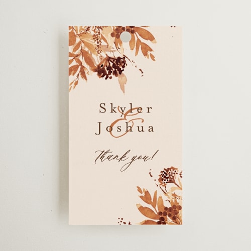 This is a rust wedding favor tags with standard by Chris Griffith called wedding in aspen printing on signature in tag
