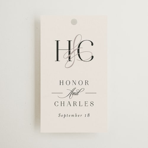 This is a ivory wedding favor tags with standard by Melanie Kosuge called honor printing on signature in tag