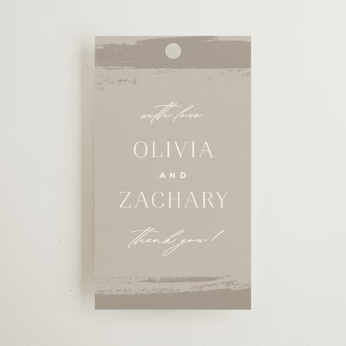 This is a clay wedding favor tags with standard by Carolyn Nicks called true love printing on signature in tag