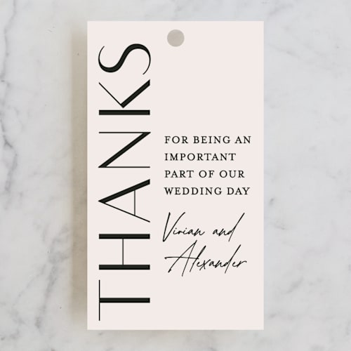 This is a ecru wedding favor tags with standard by Erica Krystek called ascent printing on signature in tag