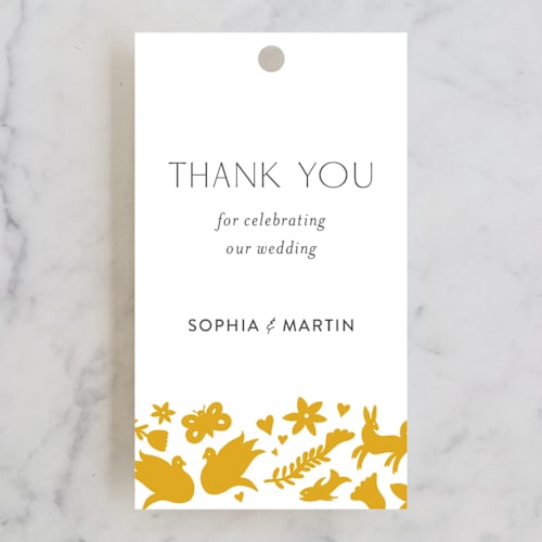 This is a sunshine wedding favor tags with standard by Shari Margolin called otomi printing on signature in tag